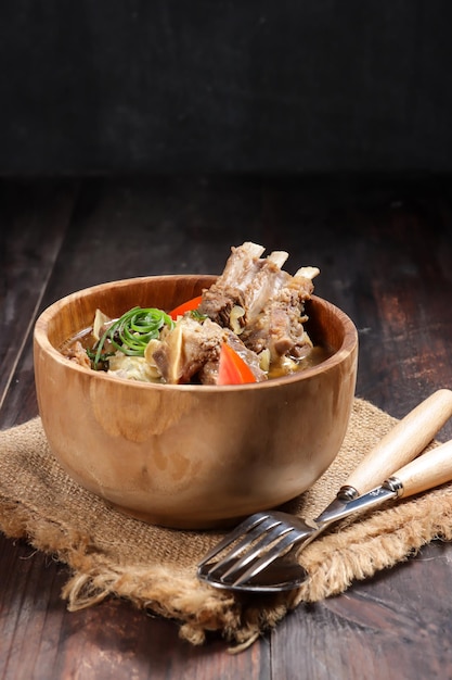 Tongseng Kambing is an Indonesian goat meat or mutton stew dish like soup with sweet soy sauce.