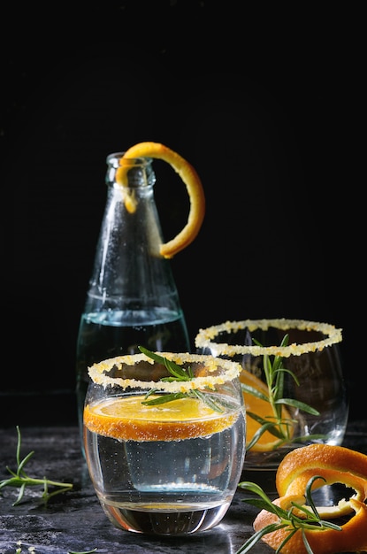 Tonic cocktail with rosemary and orange
