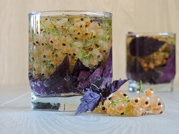 Tonic detox drink with white currants and basil.