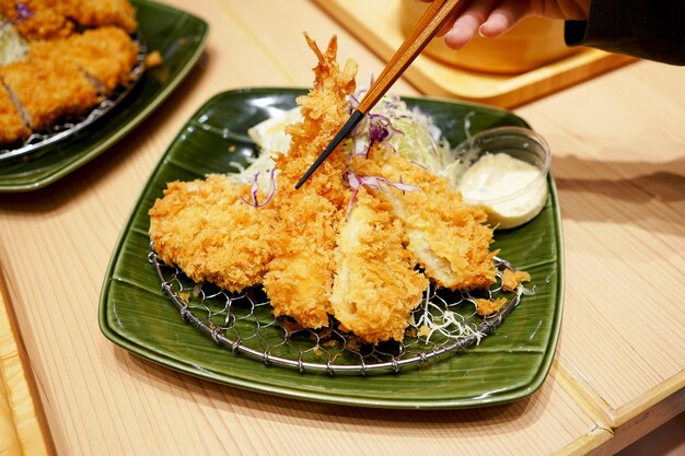 Tonkatsu of pork and vegetables with rice is a famous delicious Japanese food Rice in a pot