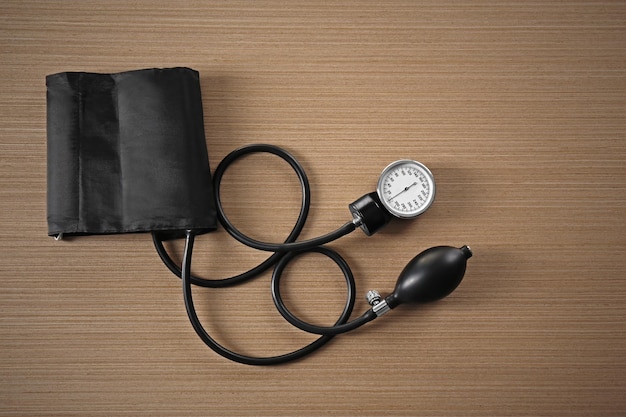 Photo tonometer on wooden table