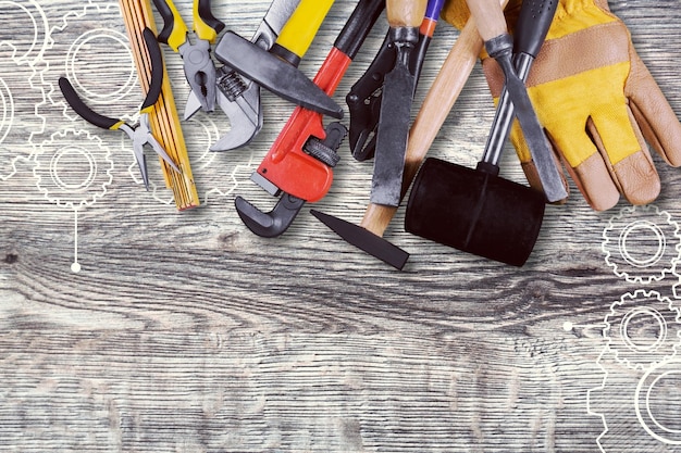 Tool belt with tools on wooden desk