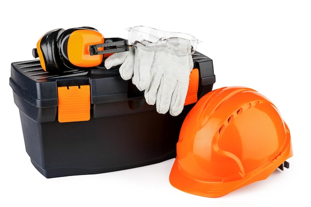 Tool box with orange helmet and various hand tools.