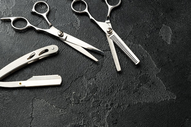 Tools for barbershop on black background studio shot