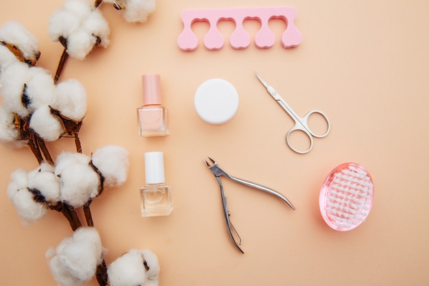 Tools for creating and for the treatment of nails on pink surface