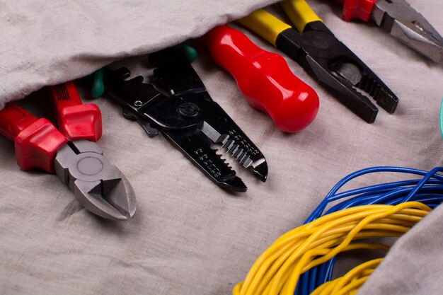 Tools for electrician and wiring on the fabric