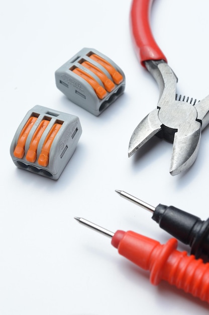 Tools for electro repair on a light background. close-up.