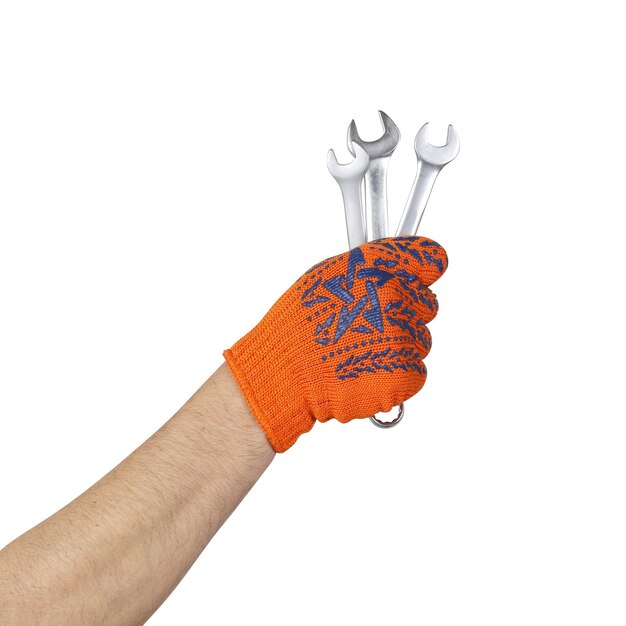 Инструменты руки действие Рука в рабочей перчатке держит гаечные ключи изолированные