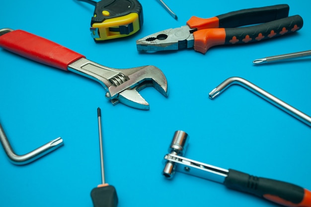 Tools on isolated blue background