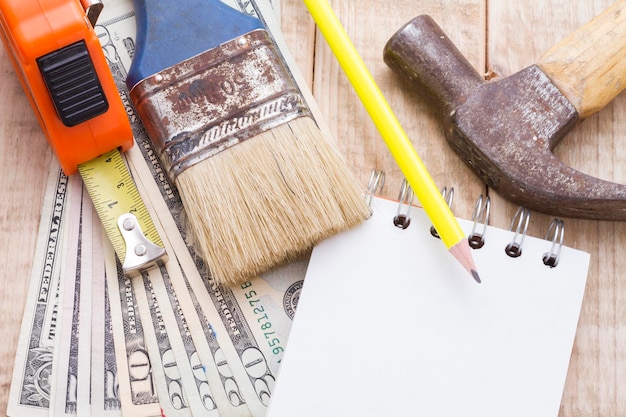 Tools and notebook to make a budget of remodeling or DIY at home