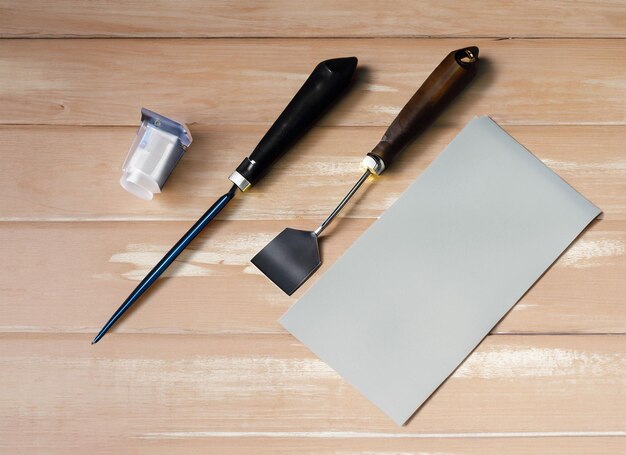 Tools of printing on wooden background