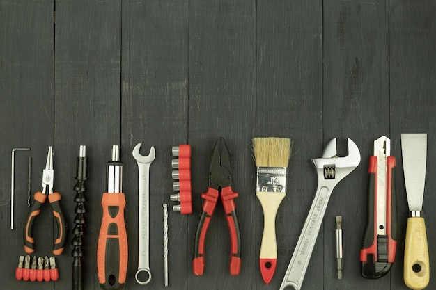 Tools on a rustic background with copy space