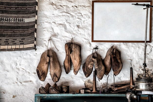 Tools and shoes in a shoemaker atelier