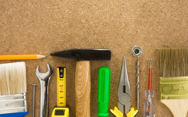 Tools on wood texture background