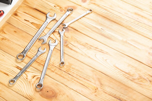 Tools on a wooden background. Place for text