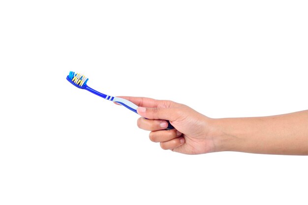 tooth brush in hand isolated on white background