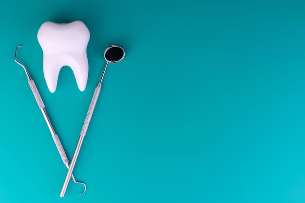 Tooth model and dentist tool copy space