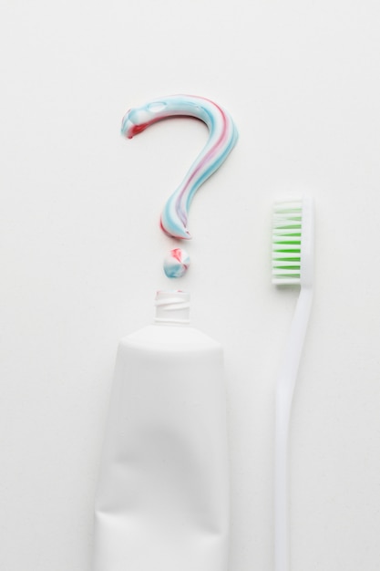 Tooth paste question mark and brush