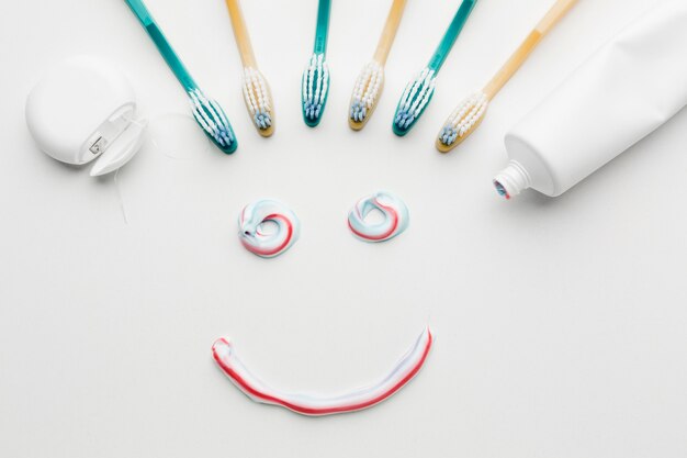 Tooth paste smile in flat lay