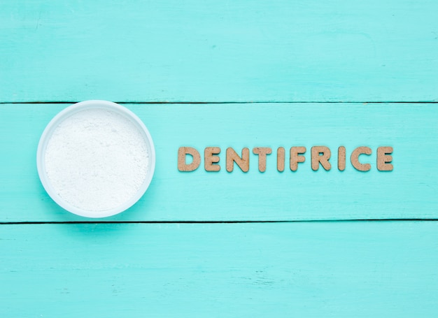 Tooth powder with word dentifrice