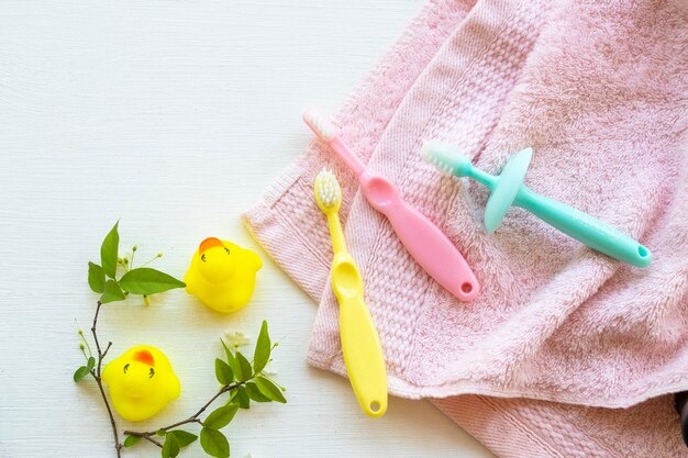 toothbrush of baby arrangement flat lay style