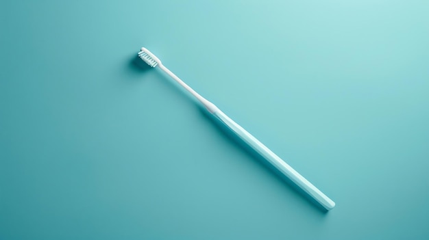 Toothbrush on a blue background The toothbrush is blue and white The bristles are white The toothbrush is angled to the right of the frame