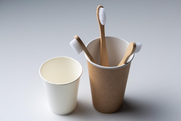 Toothbrush in a cardboard ecological cardboard cup hygiene health care