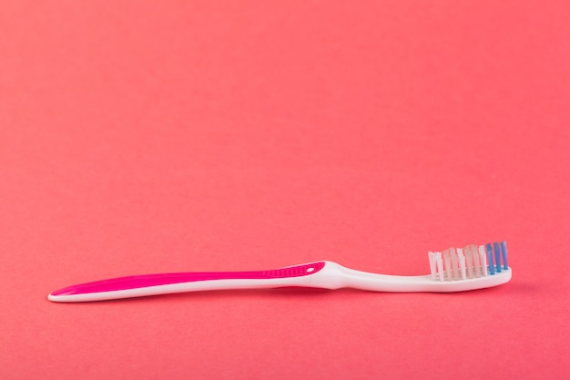 Toothbrush on red 