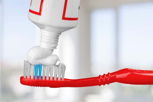 Toothbrush with toothpaste isolated on  background