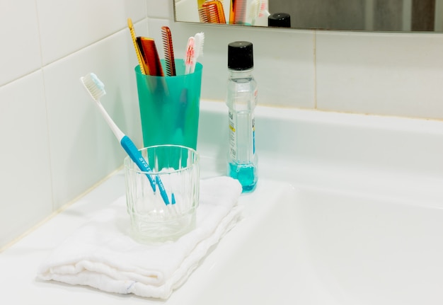 Toothbrushes and  in bathroom