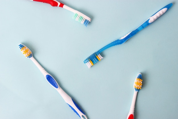 Toothbrushes on a colored background close up