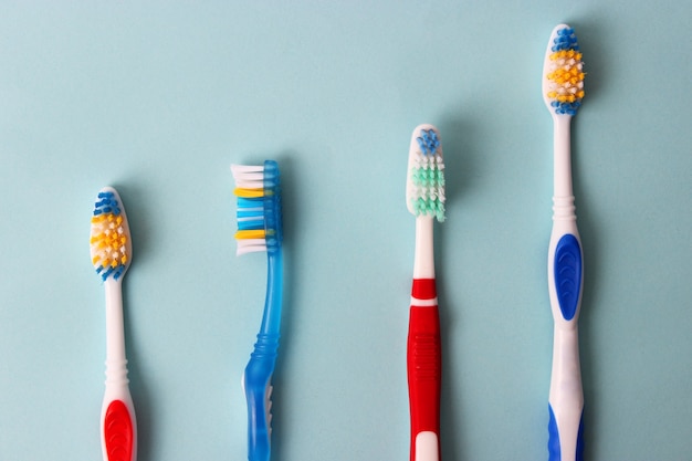 Toothbrushes on a colored background close up