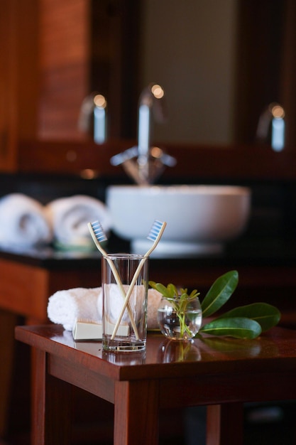 toothbrushes in a glass