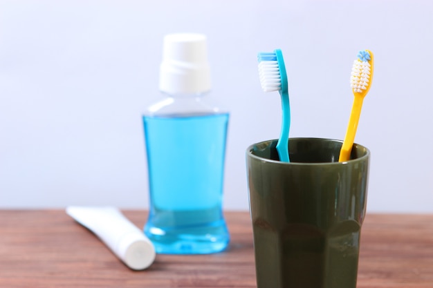 Photo toothbrushes and oral cleaners on the table