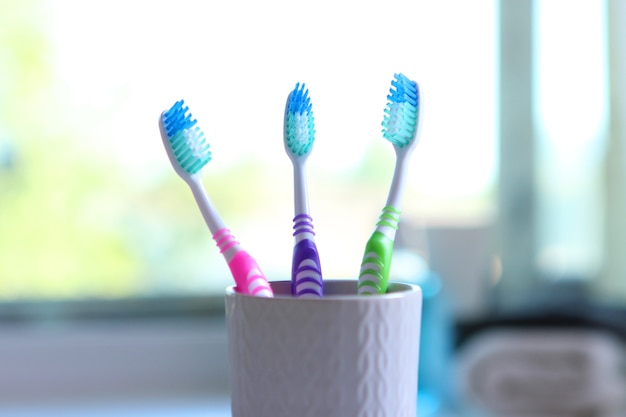 Toothbrushes and oral cleaners on the table