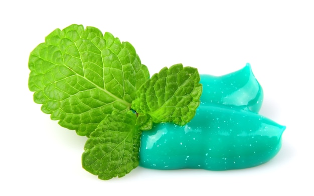 Toothpaste with mint on a white