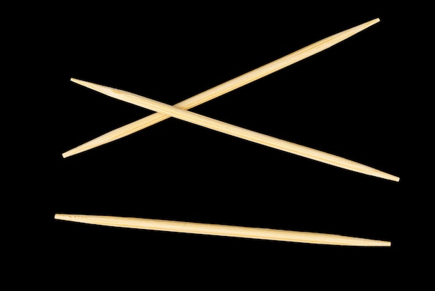 Toothpick multiple black background closeup