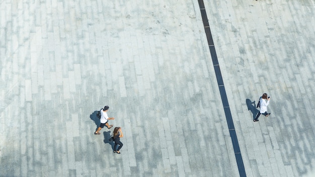 top aerial view of people walk on pedestrian street city