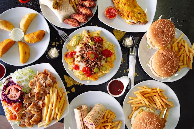 Photo top angle of various plates of different types of food