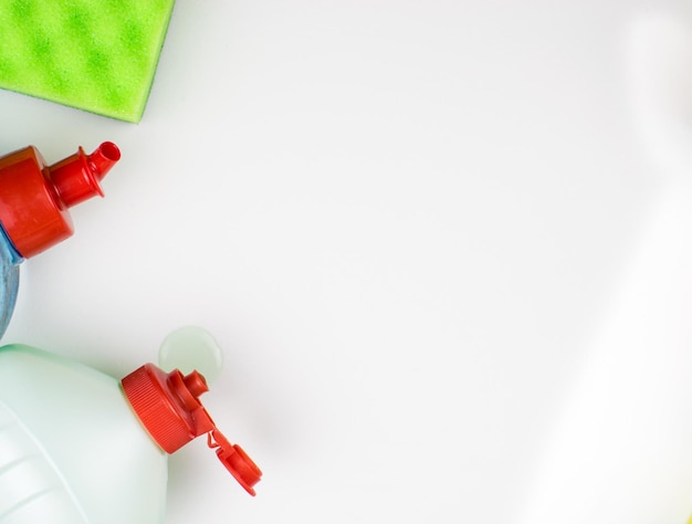 Top of bottles with detergent on a light background