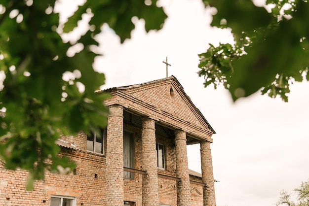 The top of the building of an old ruined church during the restoration period