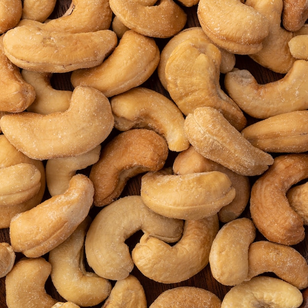 Top closeup view of salted cashew nuts.