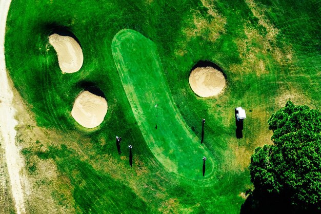 Top down aerial view of greenery golf court in the Algarve Portugal