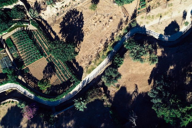 Top down aerial view of hiking path at Ribeira das Vinhas in Cascais Portugal