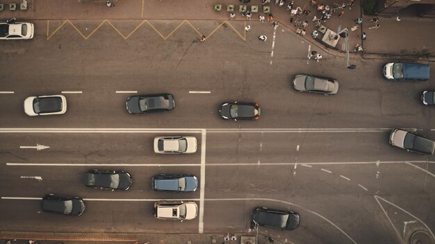 Photo top down pedestrians crosswalk road aerial people cross street cityscape crossroad men women