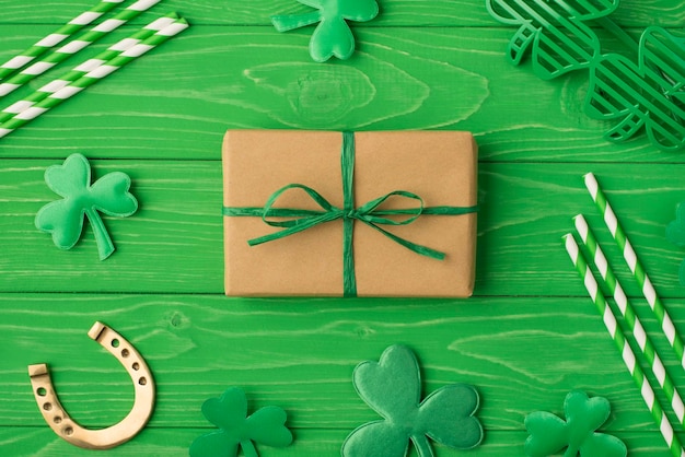 Top flat lay above overhead close up view photo image of packed in craft paper giftbox spectacles happy st patrick's day holiday isolated bright color backdrop