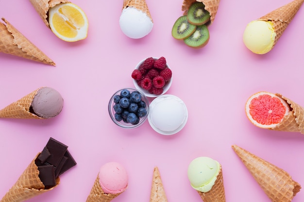 Photo top lay of ice cream flavors with pink background