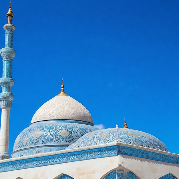 Photo top of mosque with blue sky on the background