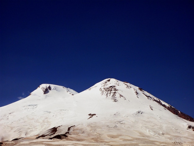 top of Mount Elbrus, one of the highest mountains in Europe, the mountain is covered with snow