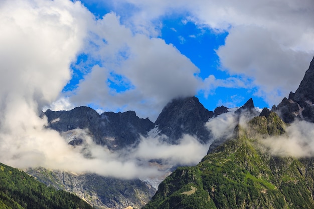 Top of the mountain with low laying clouds